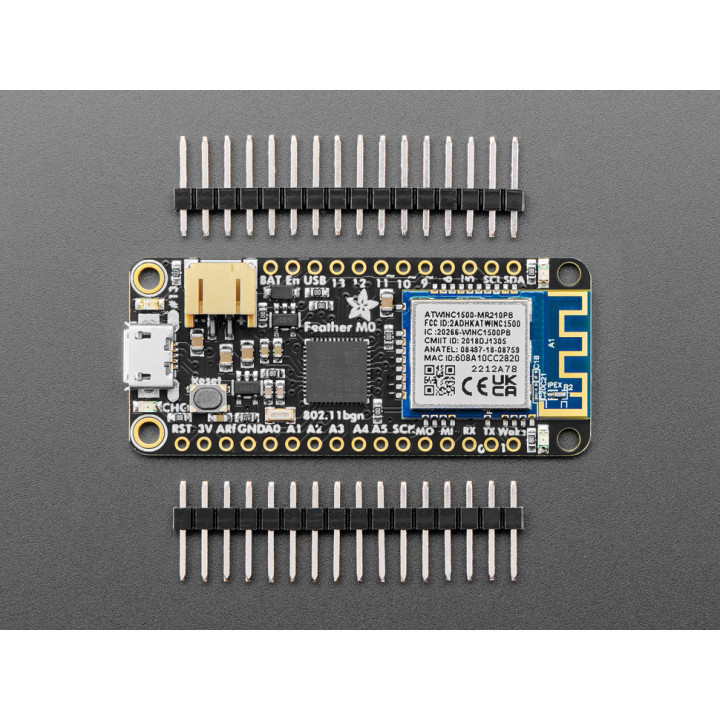 Vue du module Feather M0 WIFI (ATSAMD21 + ATWINC1500) et de ses connecteurs